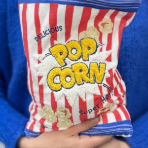 גרין קווין: כרית חימום בעיצוב שקית פופקורן בצבעים עליזים – פריט עיצובי ומרגיע לחורף