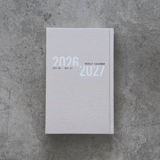 יומן שבועי 2027–2026 KARINITI בצבע אפור עם כריכת בד קשה – מתכנן שבועי מעוצב